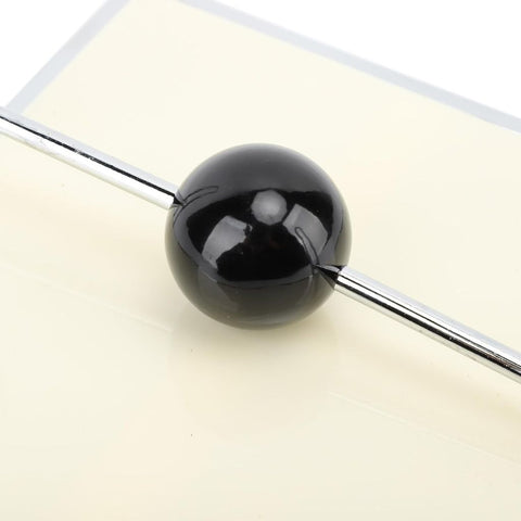 Image of Napkin Holder with Weighted Black Sphere