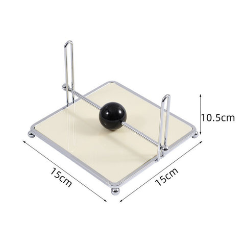 Image of Napkin Holder with Weighted Black Sphere