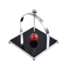 Napkin Holder with Weighted Red Sphere
